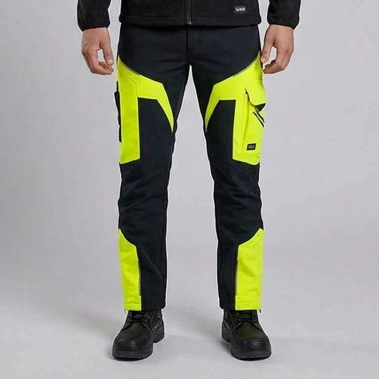 Spodnie softshell COMFORT WINTER czarno-żółte na modelu