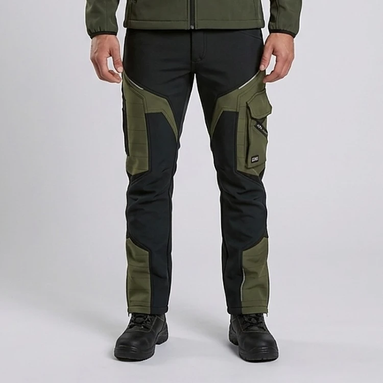 Spodnie softshell COMFORT WINTER czarno-oliwkowe na modelu