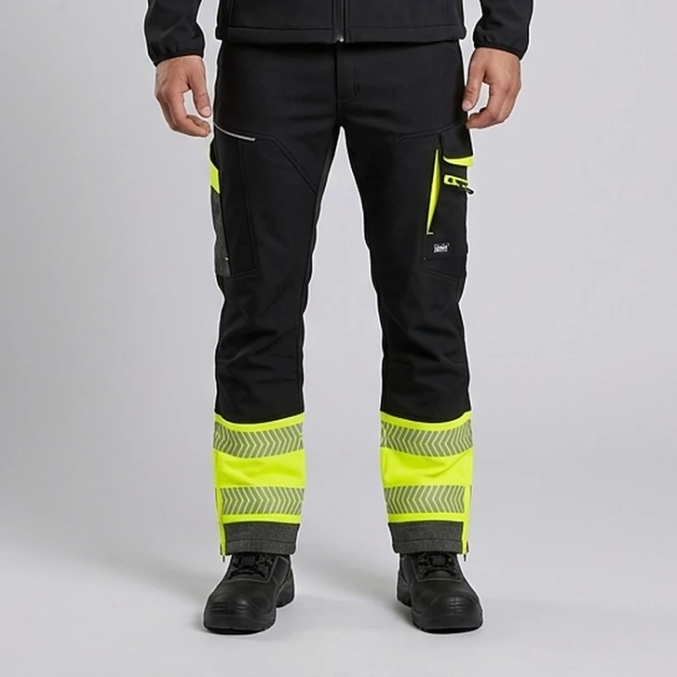 Spodnie zimowe COMFORT NEO WINTER czarno-żółte na modelu