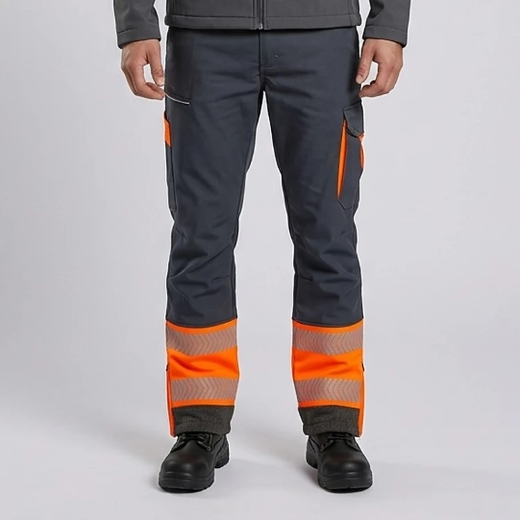 Spodnie zimowe COMFORT NEO WINTER grafitowo-pomarańczowe na modelu