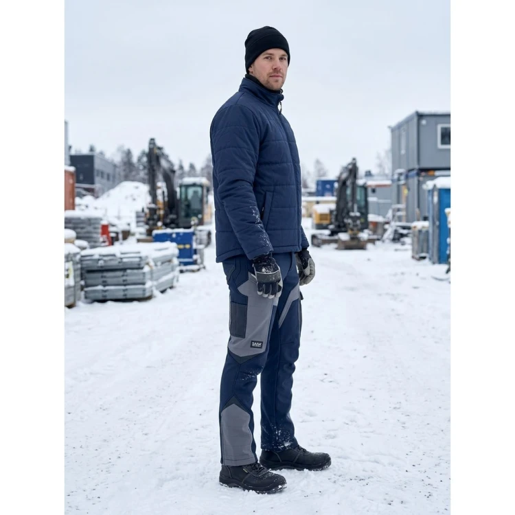 Spodnie COMFORT WINTER granatowo-szare w pracy na budowie zimą